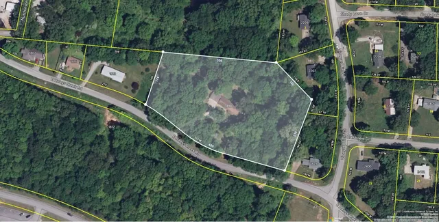 a kitchen with a table and chairs in it