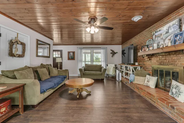 a metallic refrigerator freezer sitting in a kitchen