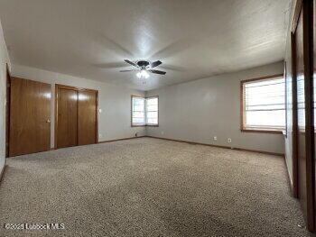 8302 Interstate 27 Lubbock, TX 79423 - Photo 11 of 21 a view of an empty room with a window