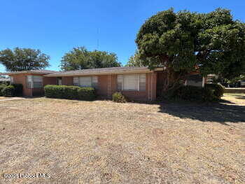 8302 Interstate 27 Lubbock, TX 79423 - Photo 2 of 21 a backyard of a house