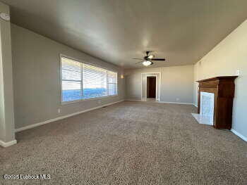 8302 Interstate 27 Lubbock, TX 79423 - Photo 4 of 21 a view of an empty room with a window
