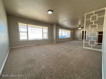 8302 Interstate 27 Lubbock, TX 79423 - Photo 5 of 21 an empty room with windows