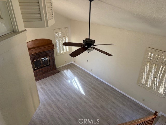 10581 Sunburst Drive Rancho Cucamonga, CA 91730 - Photo 17 of 19 a view of a room with wooden floor