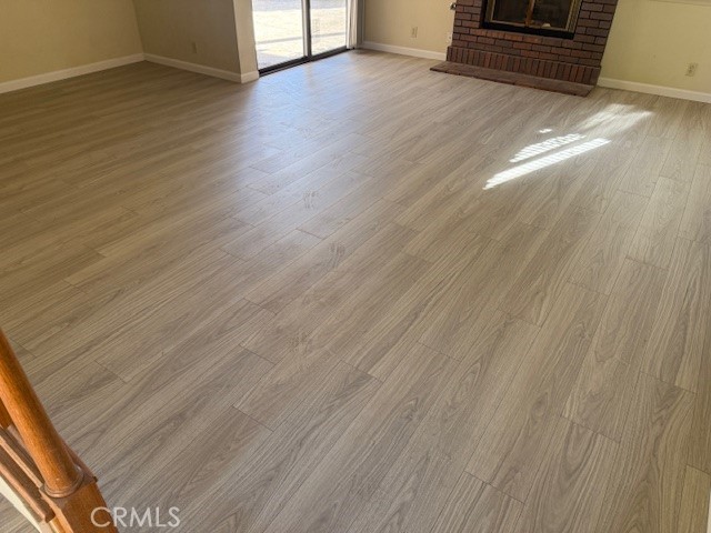 10581 Sunburst Drive Rancho Cucamonga, CA 91730 - Photo 5 of 19 a view of outdoor space with wooden floor