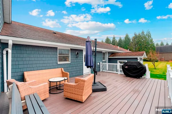 a view of a chairs on the deck