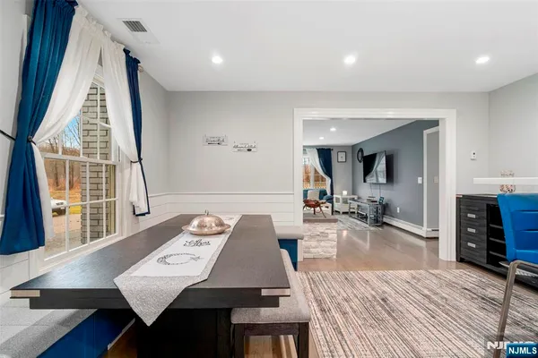 a living room with furniture and a table