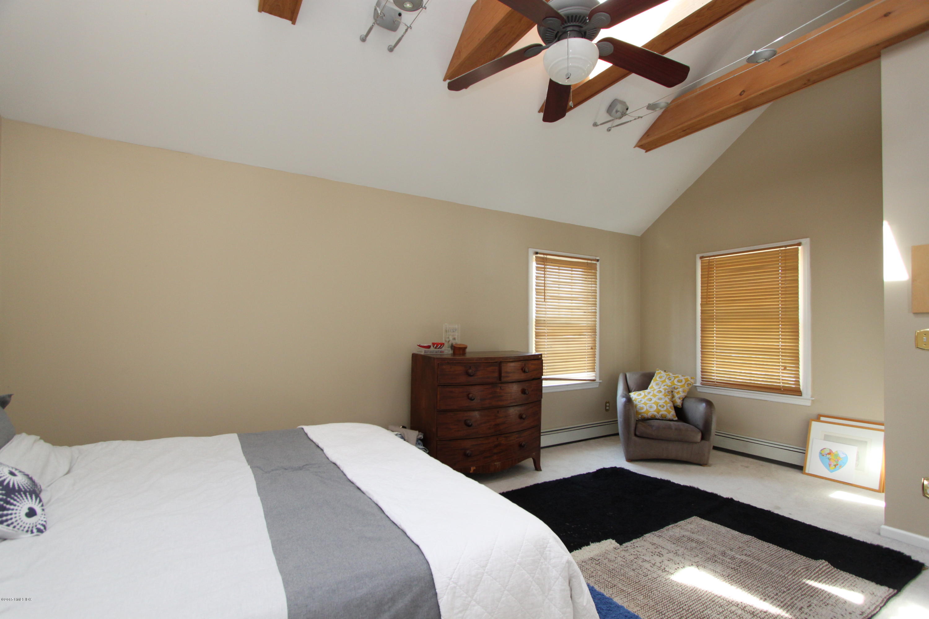 26 Thorn Hill Road Riverside, CT 06878 - Photo 7 of 14 a bedroom with a bed and wooden floor