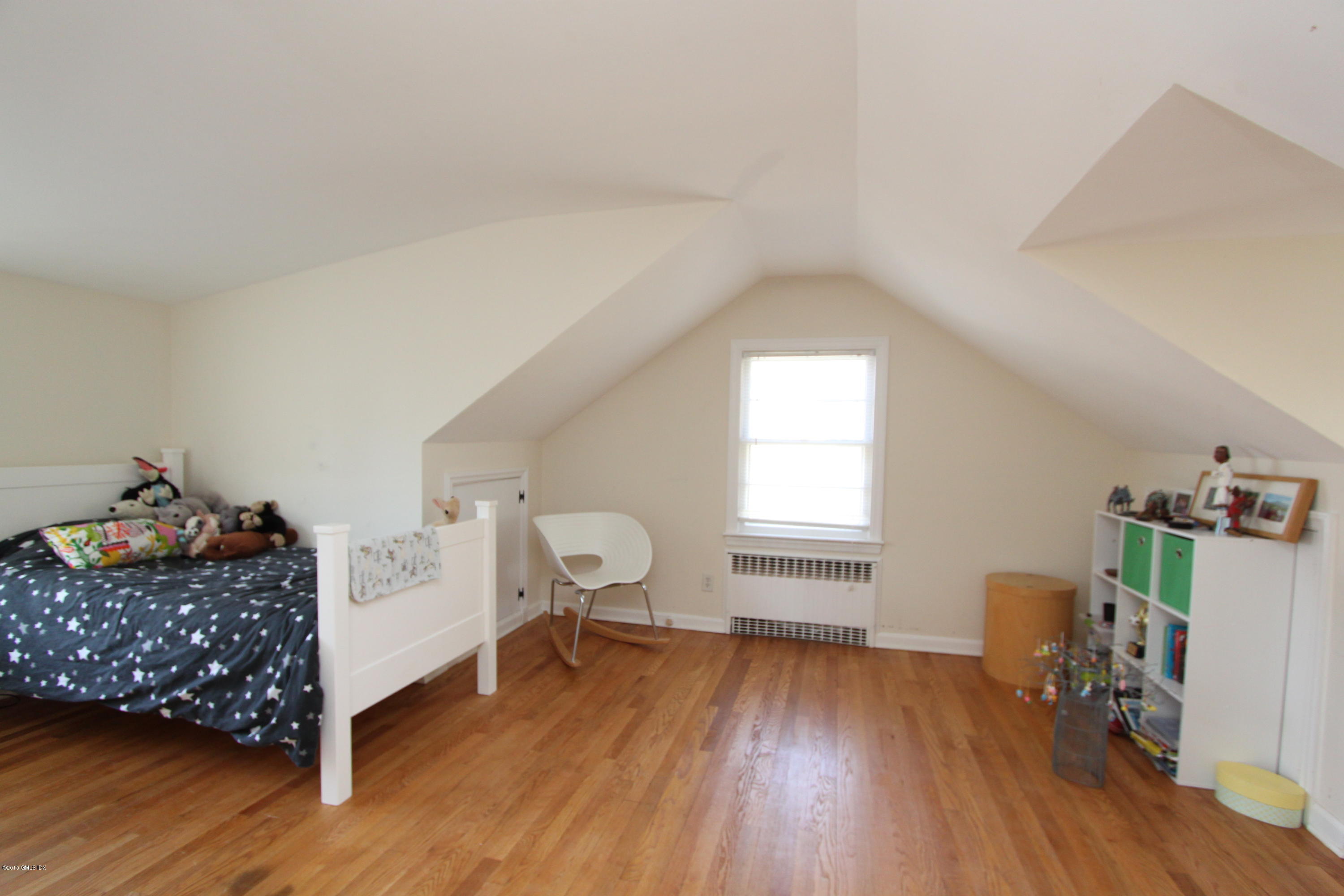 26 Thorn Hill Road Riverside, CT 06878 - Photo 9 of 14 a room with furniture and a wooden floor