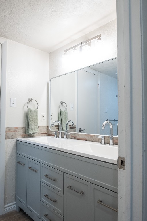2401 Bucks Run, Unit A Austin, TX 78744 - Photo 20 of 33 a bathroom with a sink and mirror