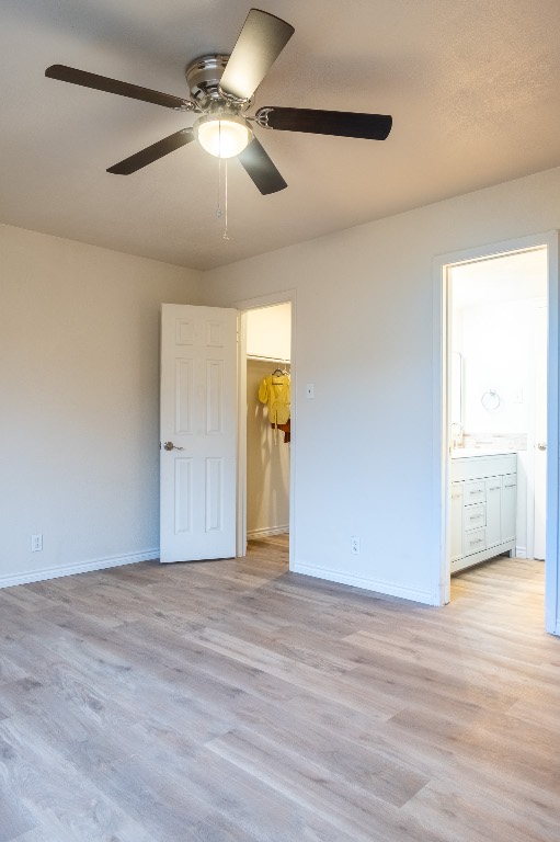 2401 Bucks Run, Unit A Austin, TX 78744 - Photo 21 of 33 a view of an empty room with wooden floor