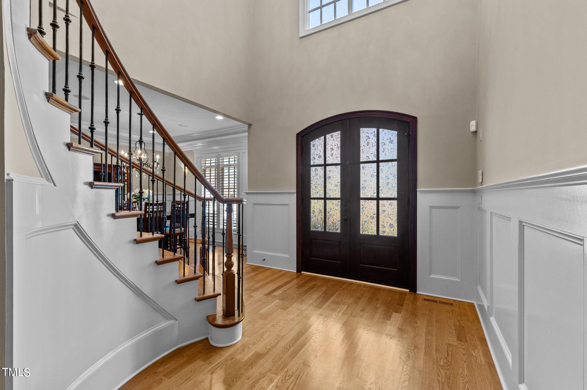 2108 Cadenza Lane Raleigh, NC 27614 - Photo 3 of 43 2 story foyer with sweeping staircase and gleaming hardwoods.