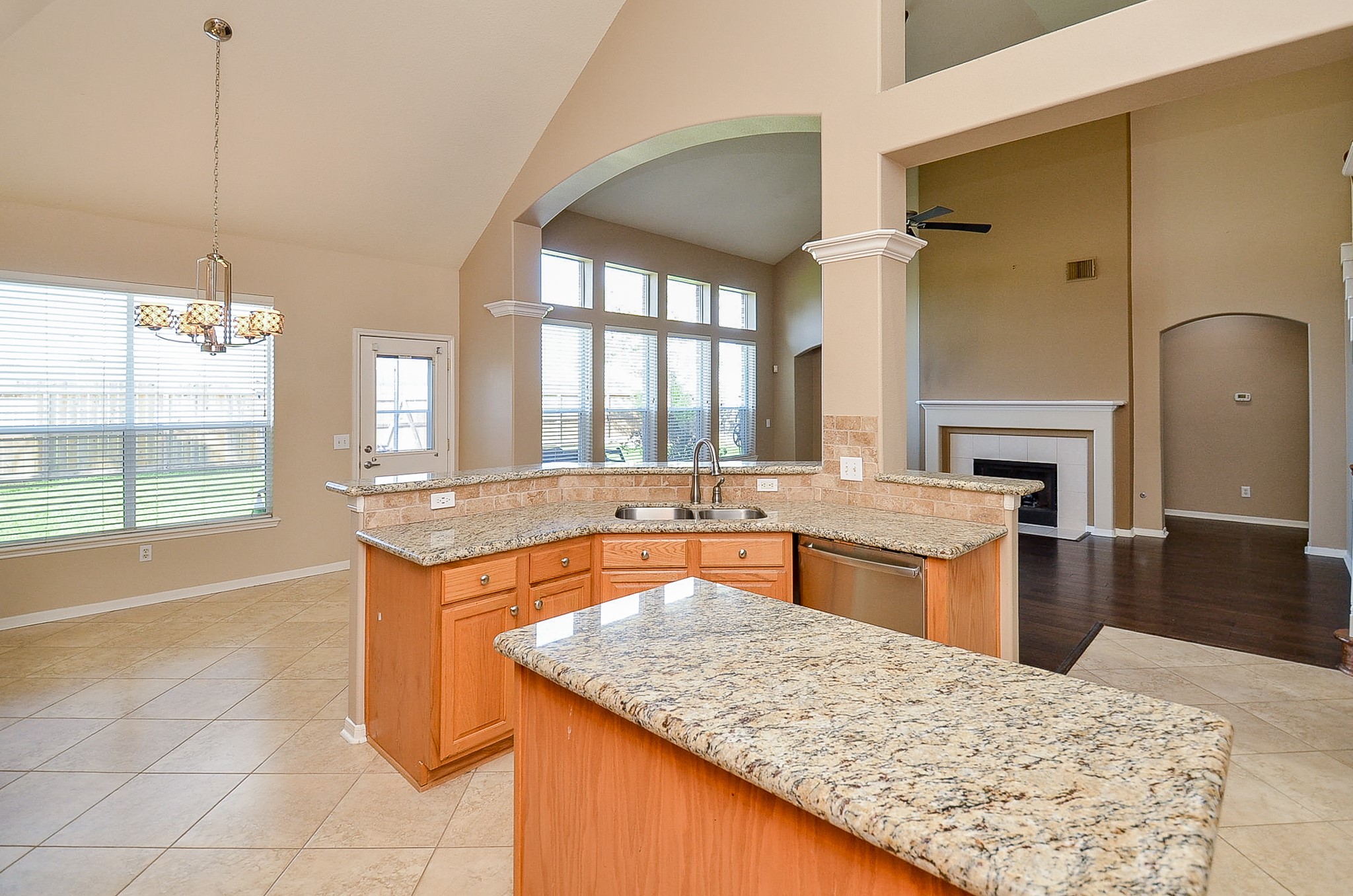 1222 Ragsdale Lane Katy, TX 77494 - Photo 15 of 31 It's easy to keep an eye on pets and kids from within. Wall of windows provides great views to the yard.