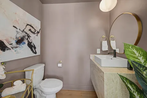 a kitchen with stainless steel appliances a sink and a large window