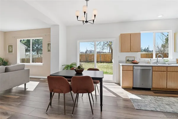 a kitchen with a refrigerator stove and microwave