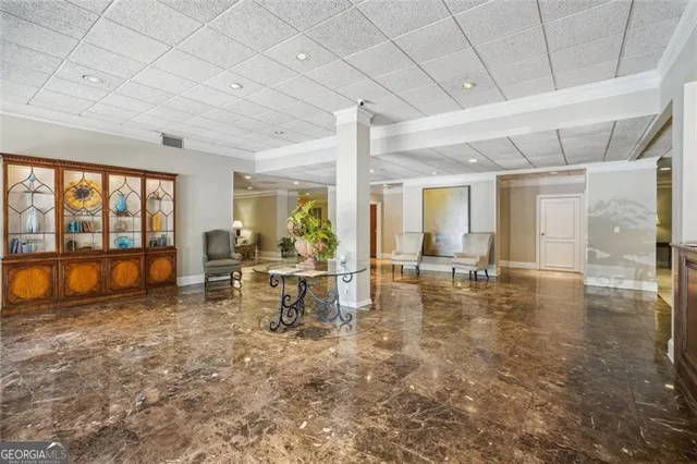 a view of a living room with a flat screen tv