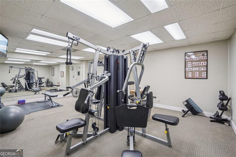 3530 Piedmont Road Northeast, Unit 2I Atlanta, GA 30305 - Photo 22 of 26 a view of a room with gym equipment