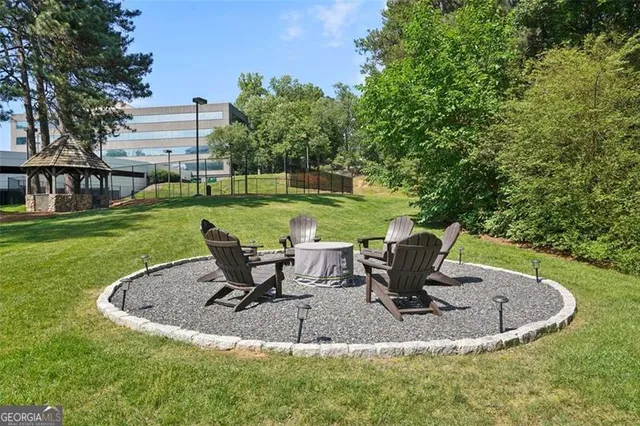 a view of a swimming pool with a sitting space