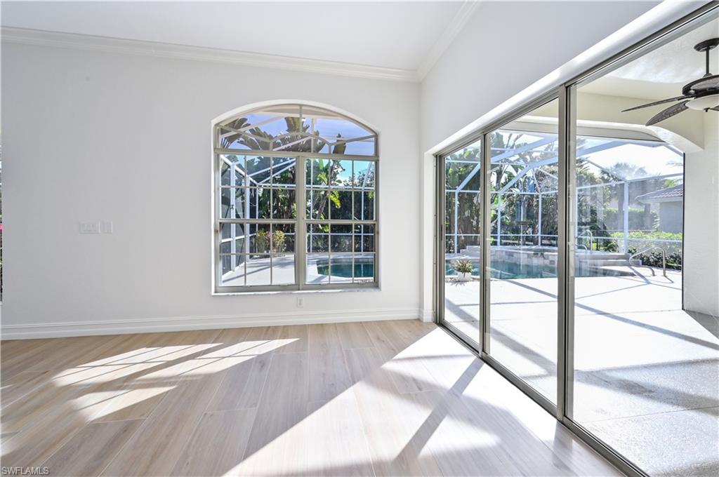 2312 Harrier Run Naples, FL 34105 - Photo 11 of 21 a view of a large window with an outdoor space