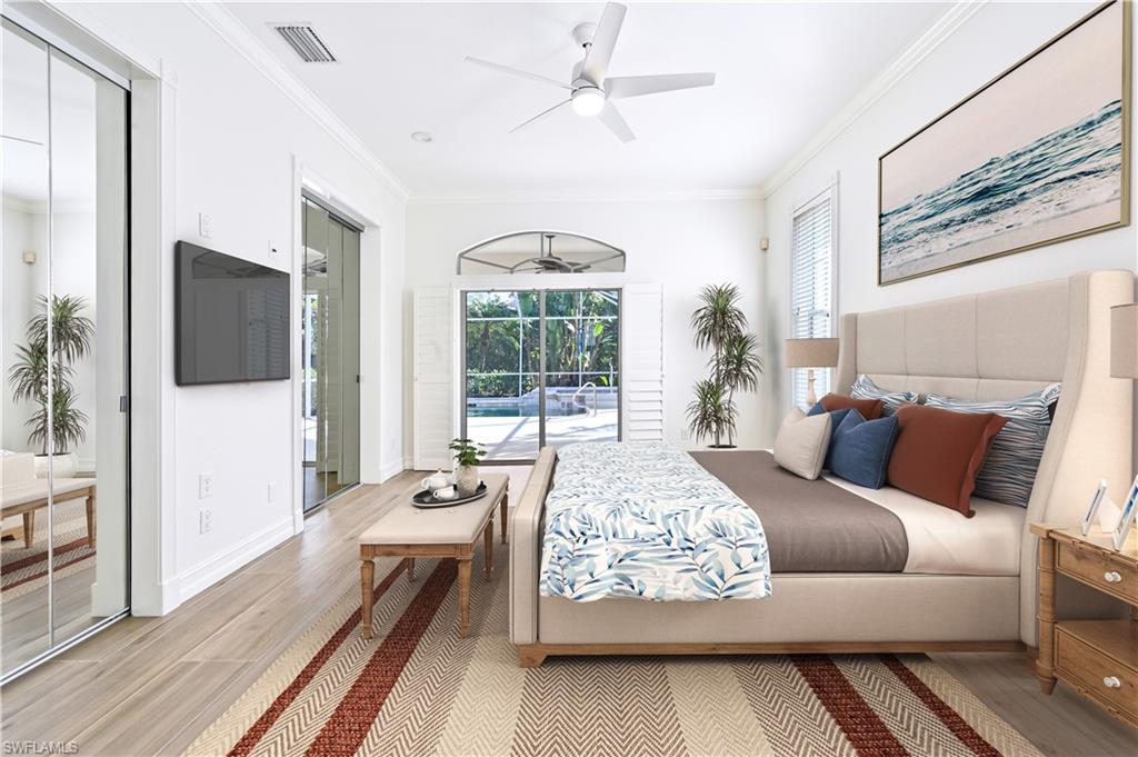 2312 Harrier Run Naples, FL 34105 - Photo 15 of 21 a living room with furniture fireplace and flat screen tv