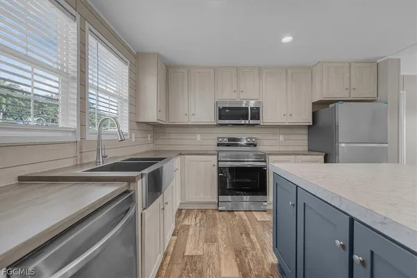 a view of kitchen and sink