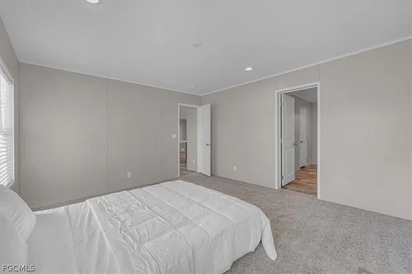a bathroom with double sink and a mirror