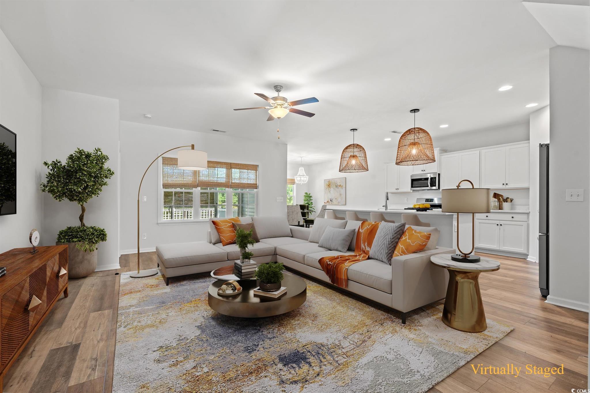 3026 Millstone Place Georgetown, SC 29440 - Photo 2 of 34 Living room with light wood-type flooring, a ceiling fan, and recessed lighting