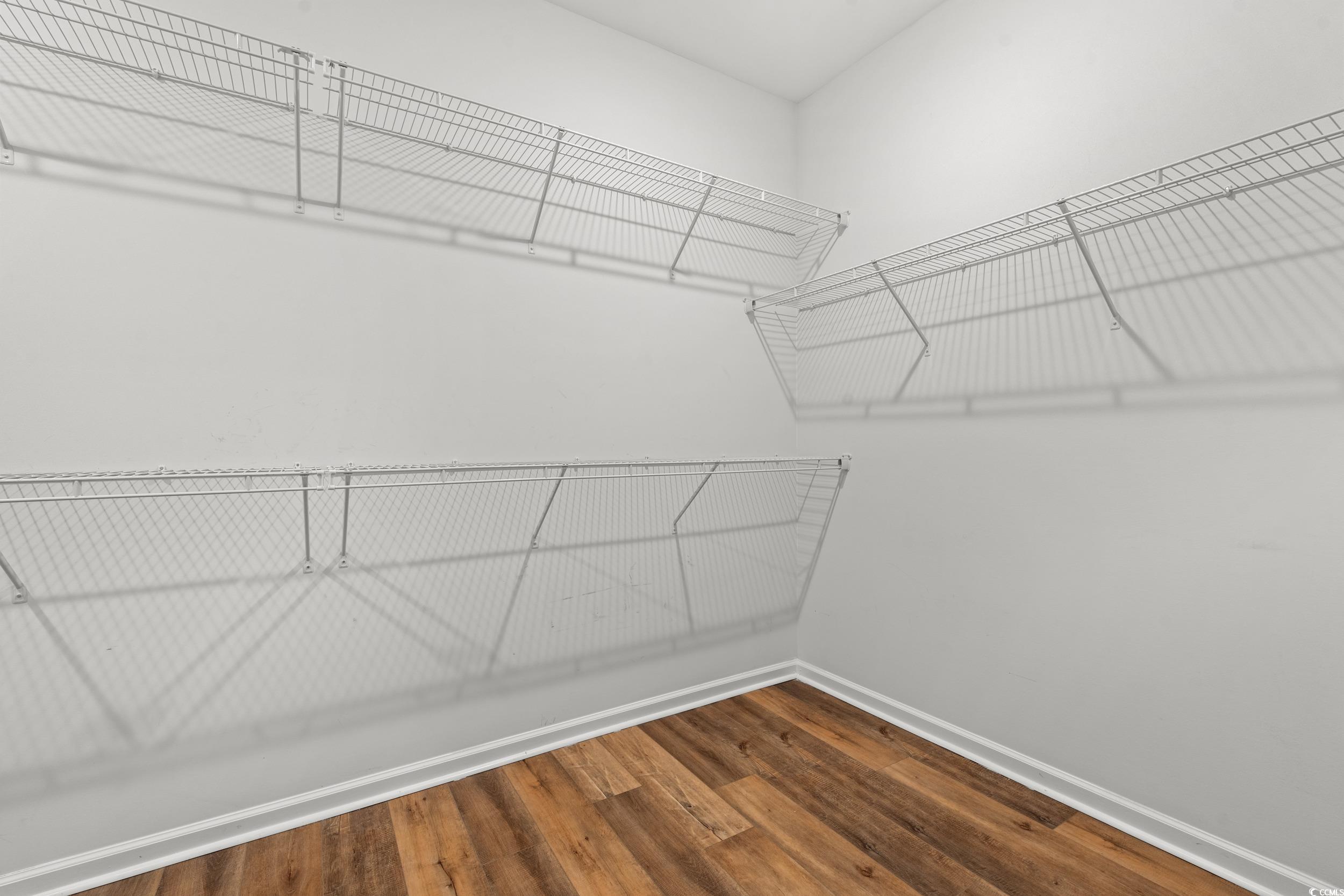 3026 Millstone Place Georgetown, SC 29440 - Photo 8 of 34 Walk in closet featuring wood finished floors