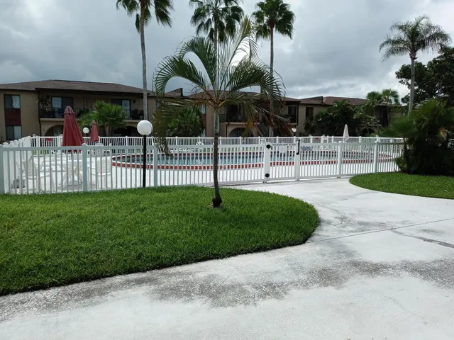 a view of a backyard of the house