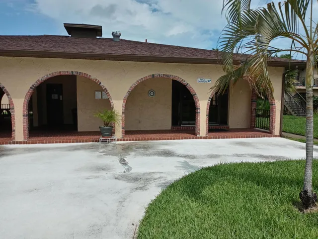 a view of a yard and a patio