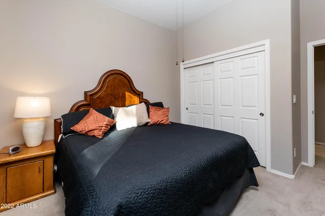 a kitchen with stainless steel appliances granite countertop a refrigerator a stove a sink and a microwave