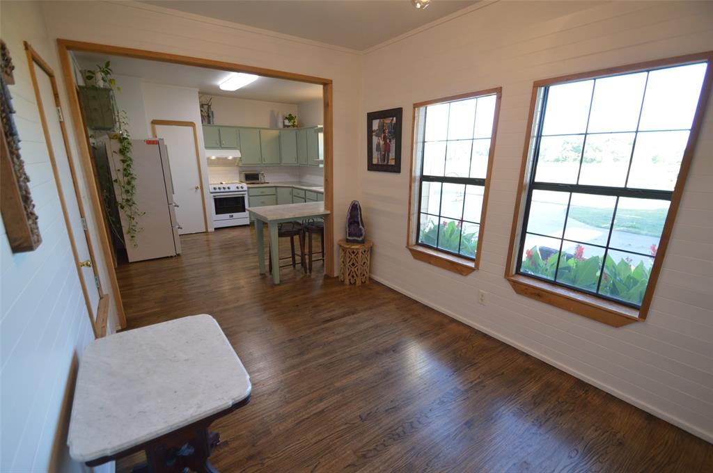 261 Red Road Howe, TX 75459 - Photo 13 of 40 a view of a dining room with furniture window and wooden floor