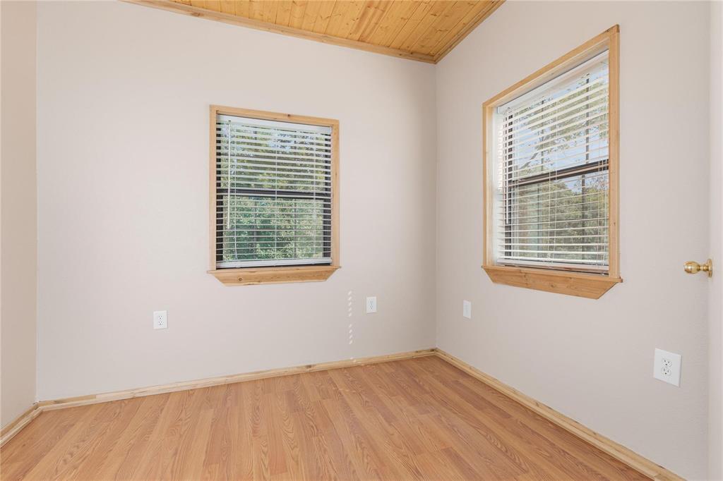 261 Red Road Howe, TX 75459 - Photo 25 of 40 an empty room with a window