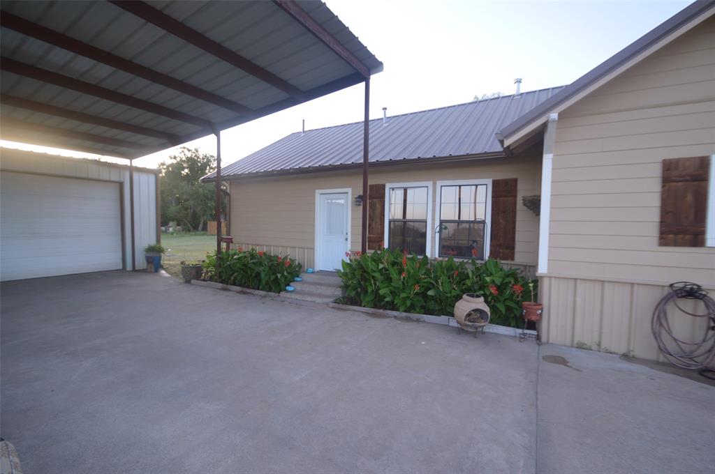 261 Red Road Howe, TX 75459 - Photo 31 of 40 a view of a house with a patio