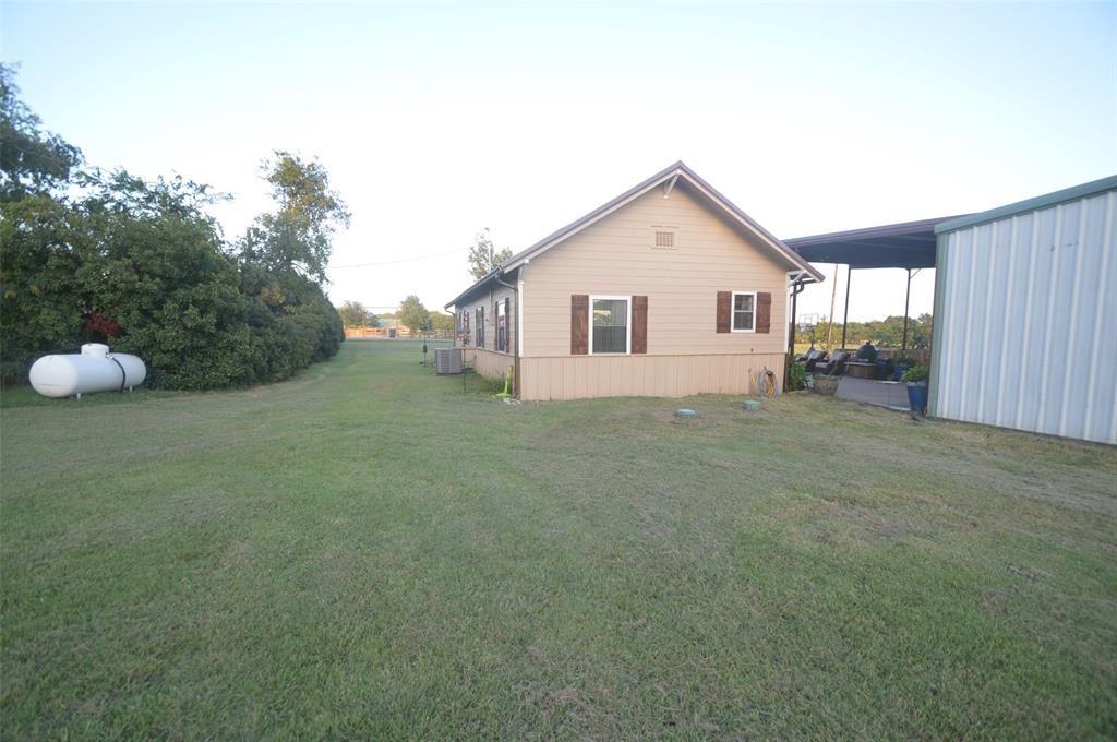 261 Red Road Howe, TX 75459 - Photo 33 of 40 a view of a house with backyard and garden