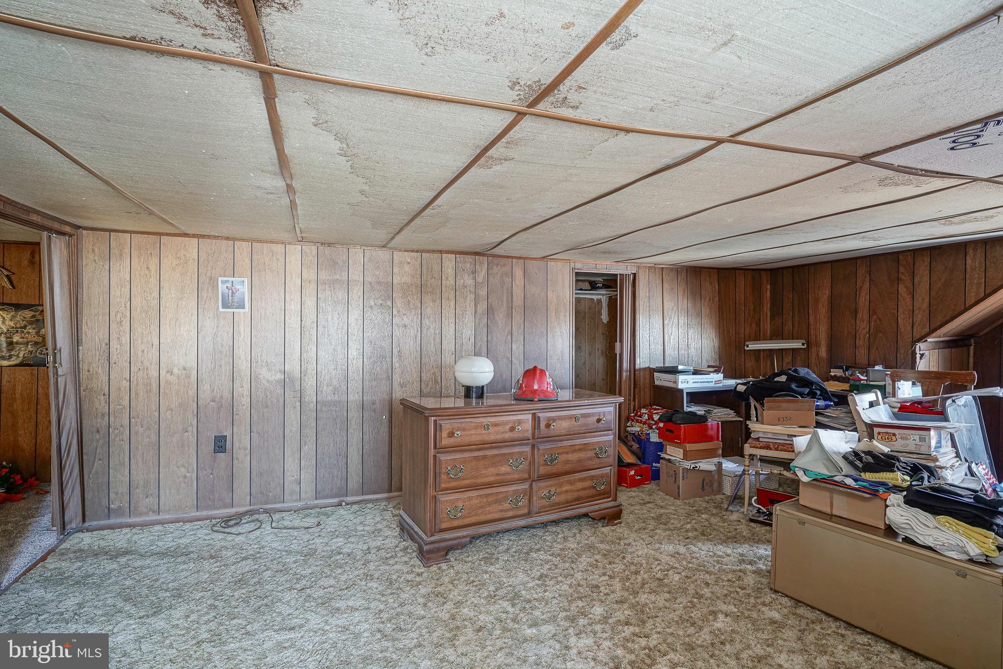 1925 Good Intent Road Woodbury, NJ 08096 - Photo 10 of 30 a living room with lots of furniture and a chandelier