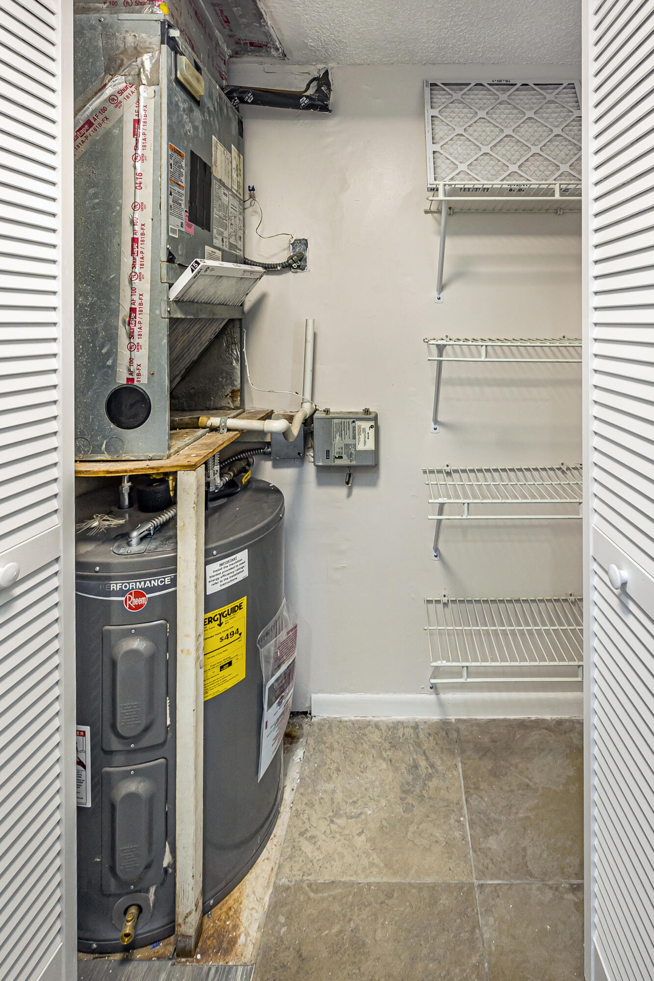 829 Camino Road, Unit 206C Delray Beach, FL 33445 - Photo 23 of 32 AC/heater closet