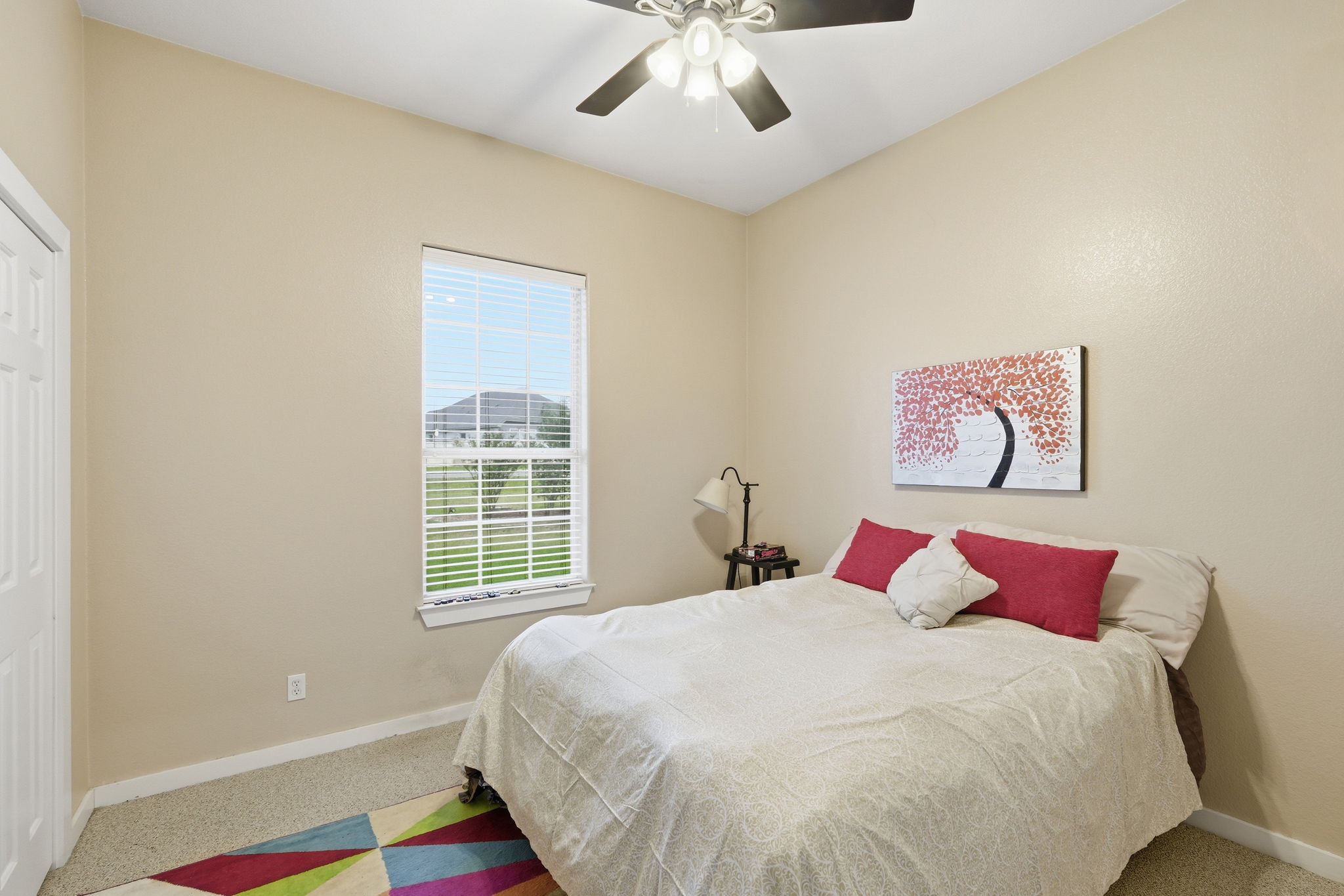 21007 Hodde Lane Pflugerville, TX 78660 - Photo 15 of 30 a bedroom with a bed and a window