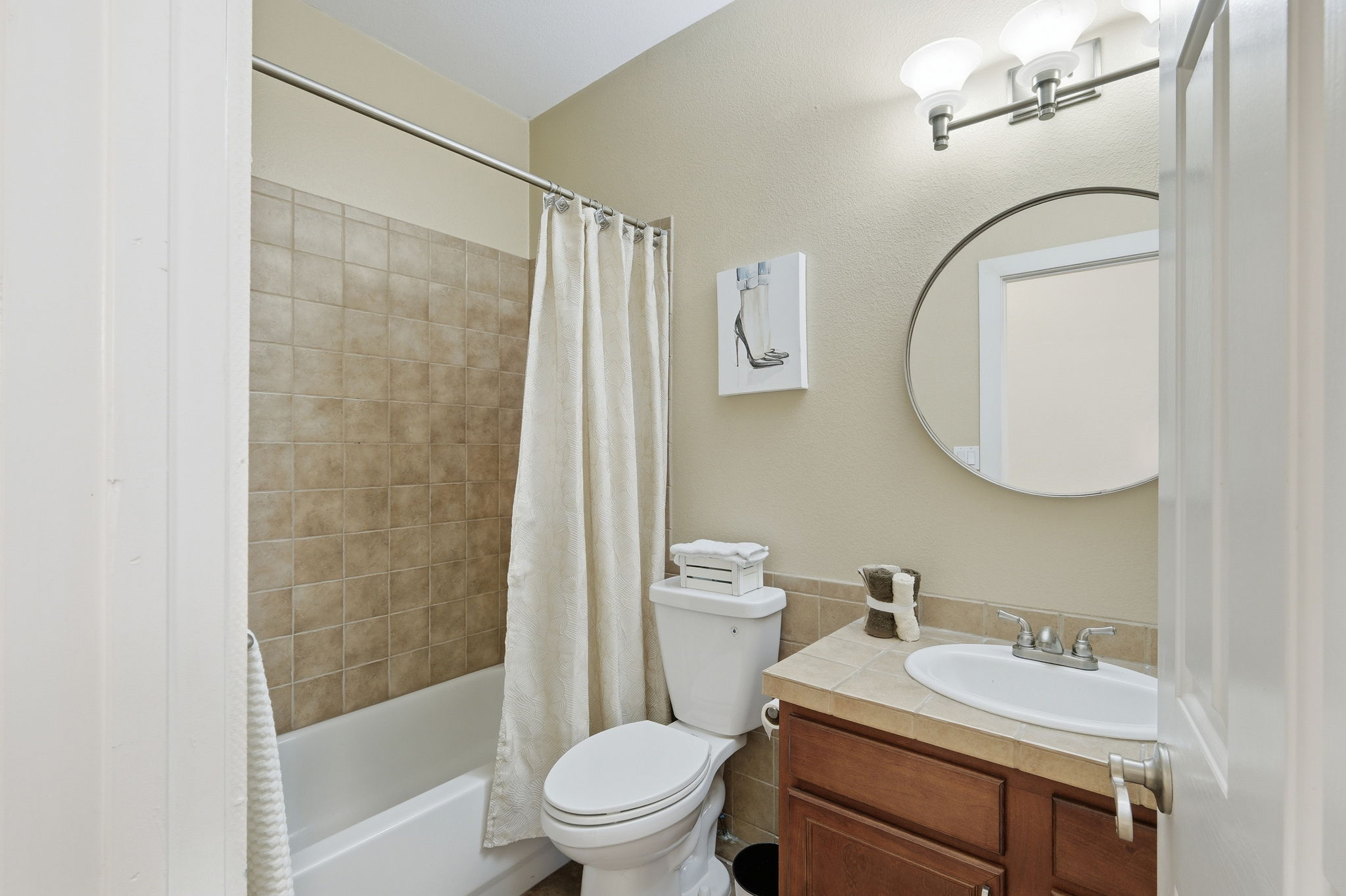 21007 Hodde Lane Pflugerville, TX 78660 - Photo 16 of 30 a bathroom with a sink toilet and shower