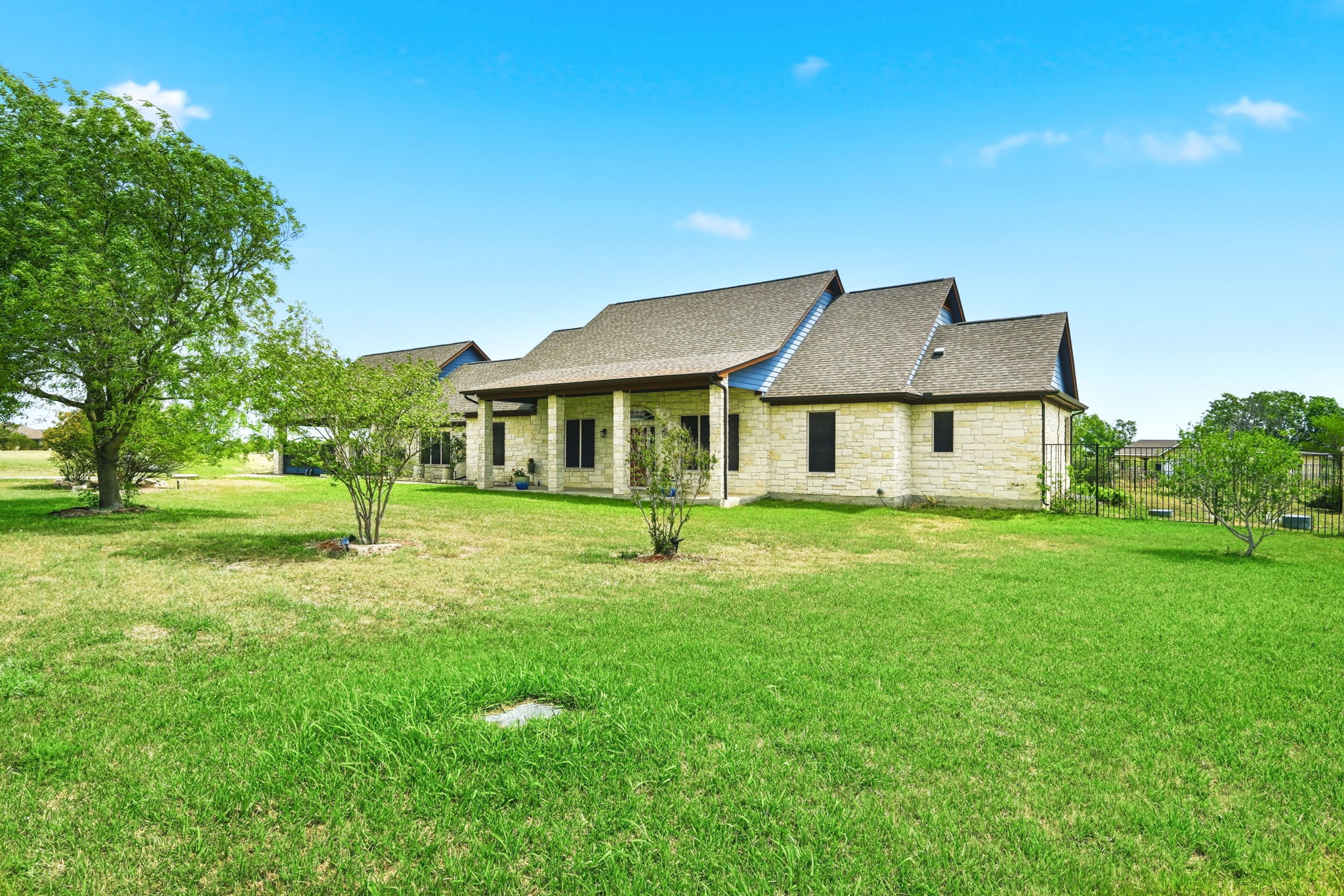 21007 Hodde Lane Pflugerville, TX 78660 - Photo 2 of 30 a front view of a house with a yard