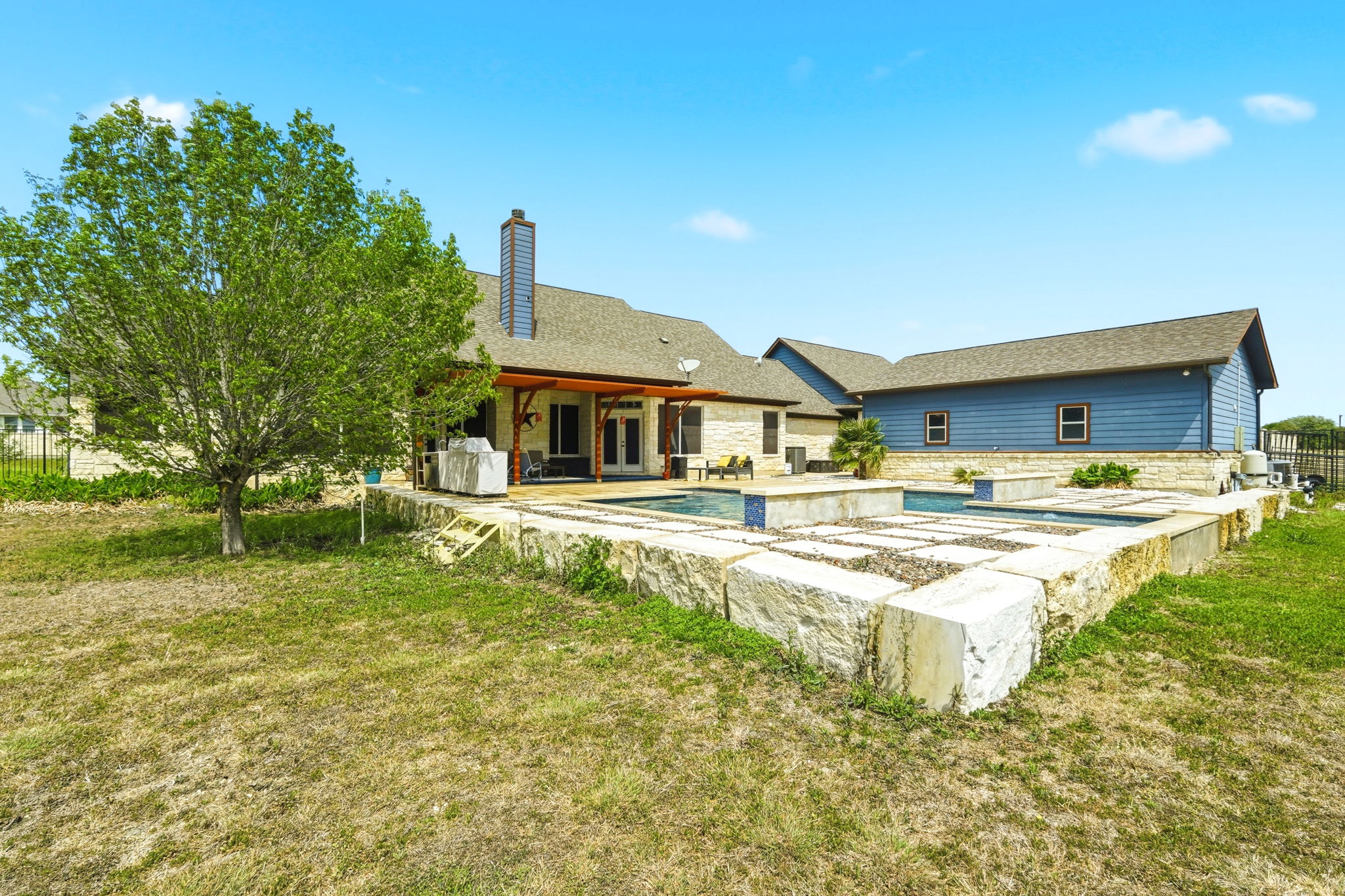 21007 Hodde Lane Pflugerville, TX 78660 - Photo 22 of 30 a swimming pool with outdoor seating and yard