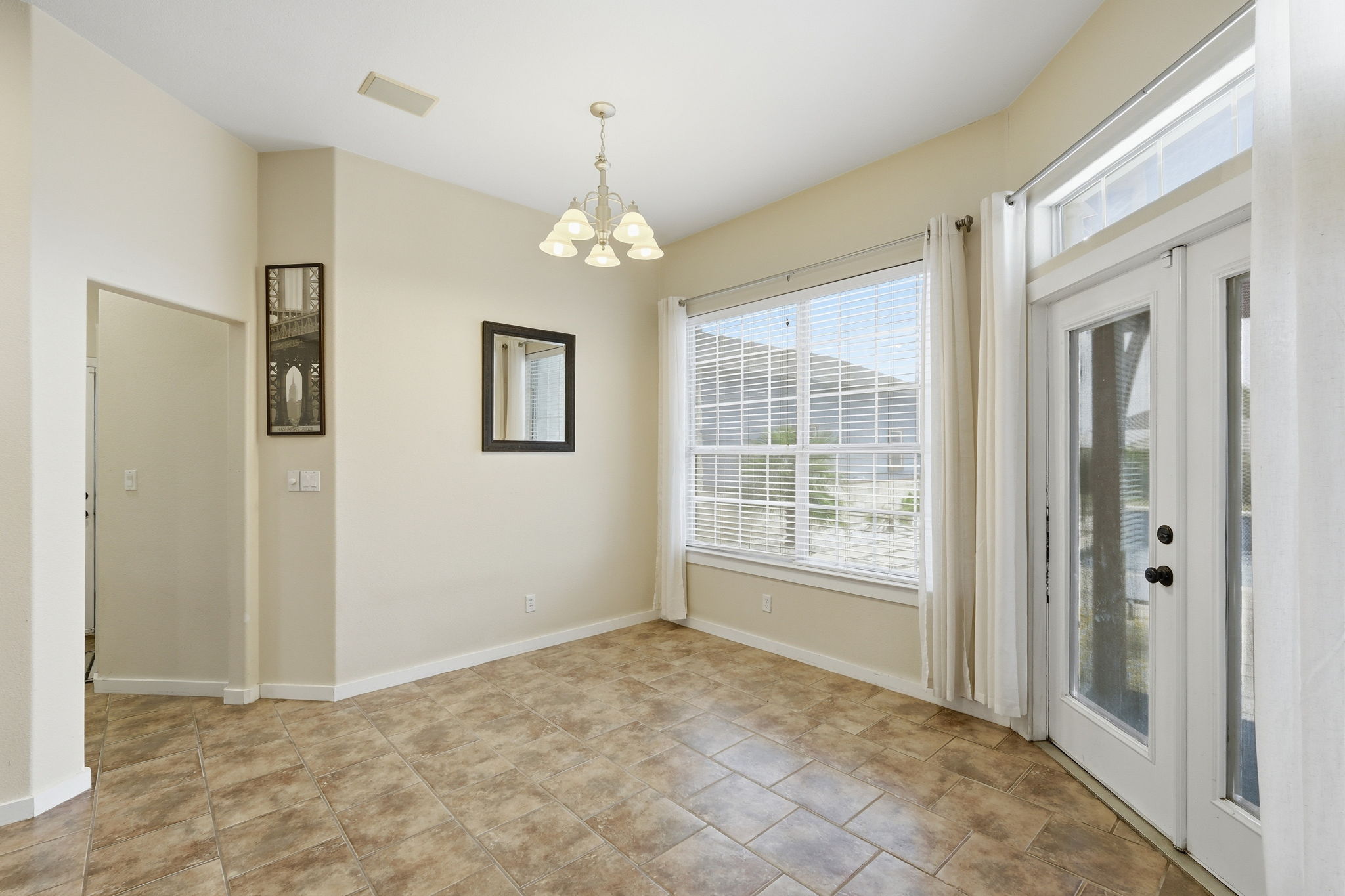 21007 Hodde Lane Pflugerville, TX 78660 - Photo 8 of 30 a view of an empty room with a window