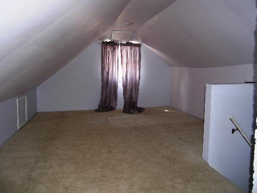 23W662 West Irving Park Road Roselle, IL 60172 - Photo 13 of 14 a view of an empty room with wooden floor
