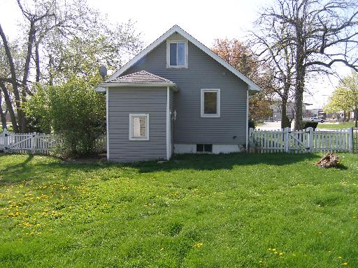 23W662 West Irving Park Road Roselle, IL 60172 - Photo 3 of 14 a front view of house with yard and green space