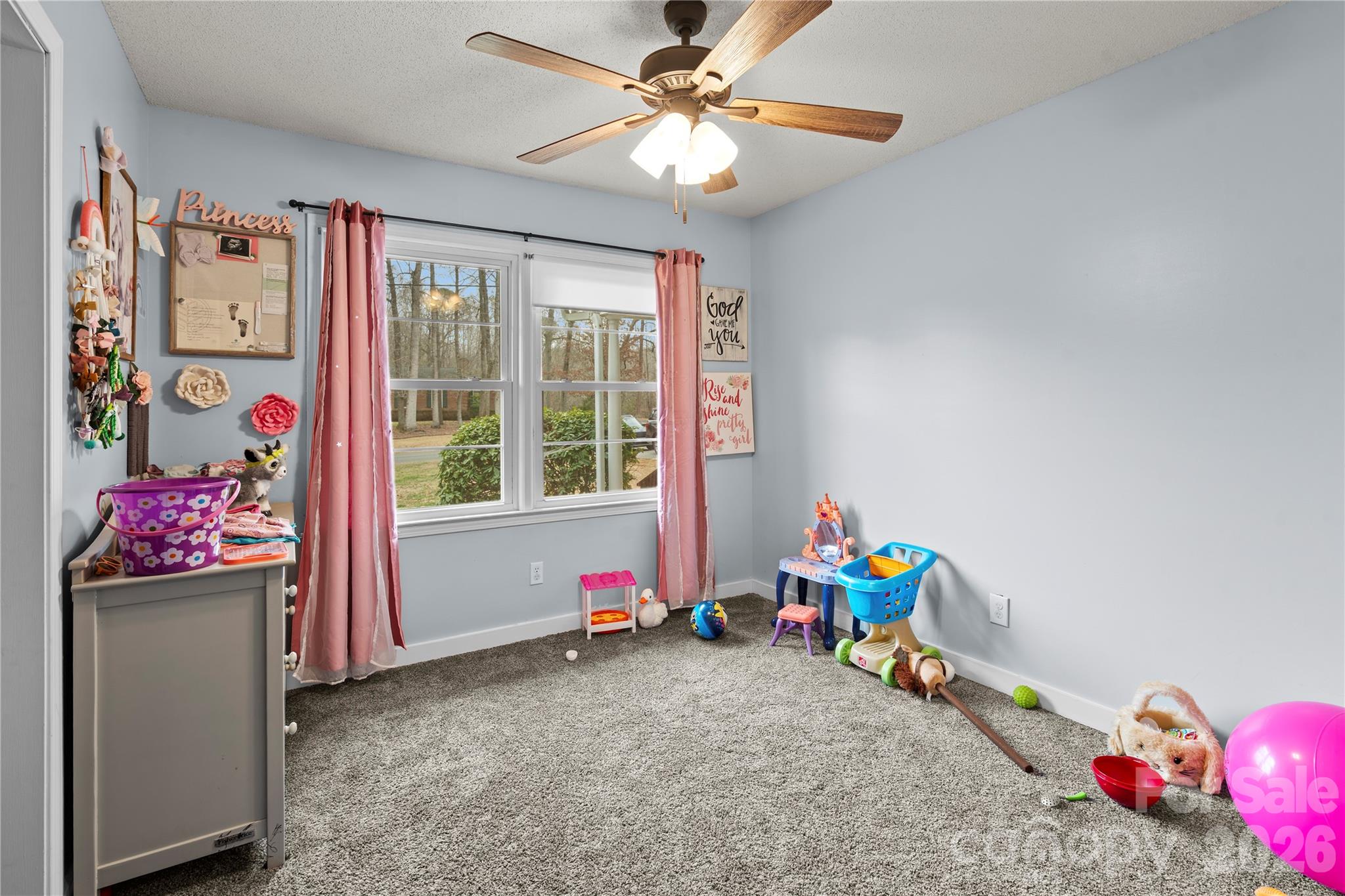 2231 Snuggs Park Road Albemarle, NC 28001 - Photo 13 of 30 a children room with toys and a chandelier