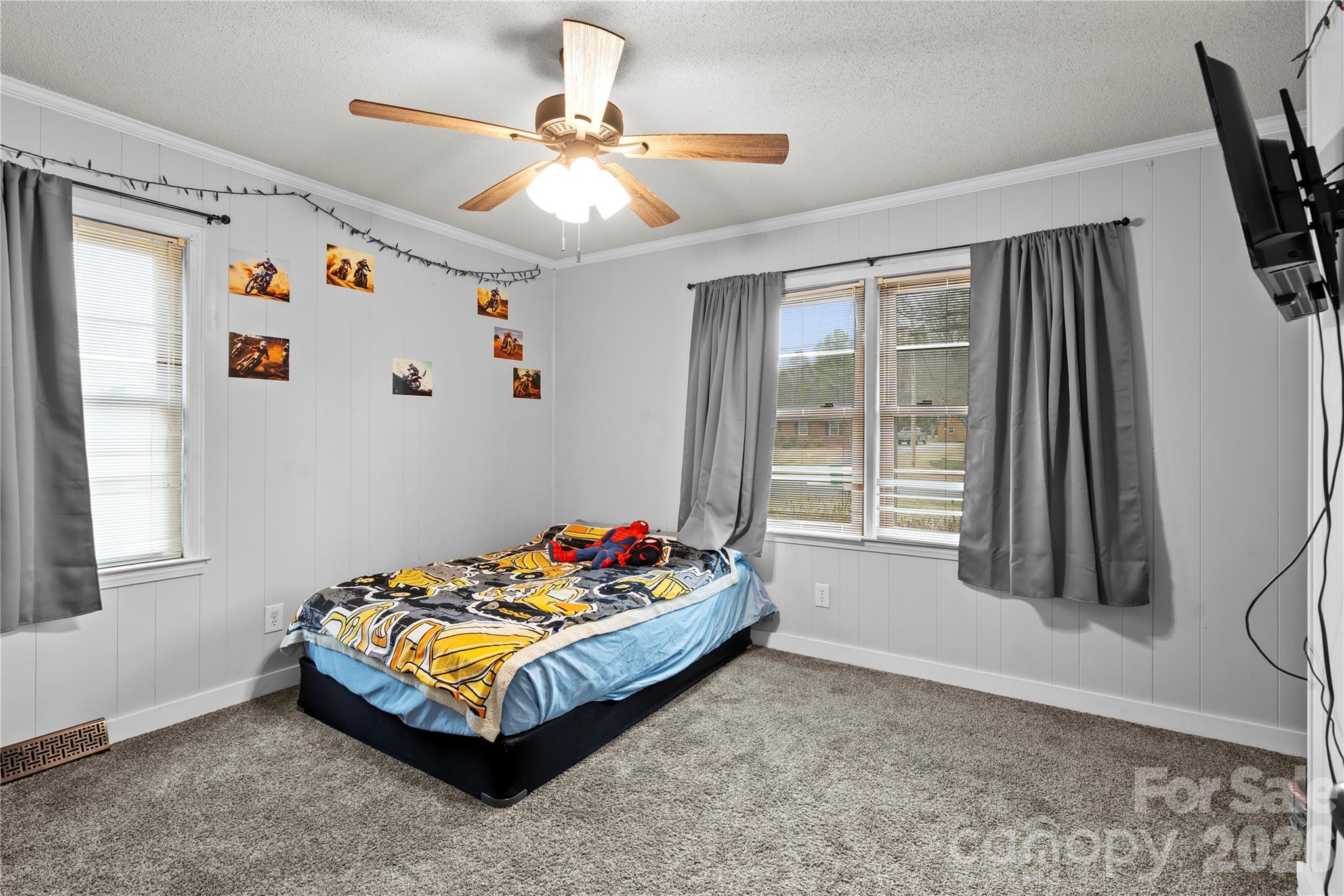 2231 Snuggs Park Road Albemarle, NC 28001 - Photo 17 of 30 a bedroom with a bed and a window