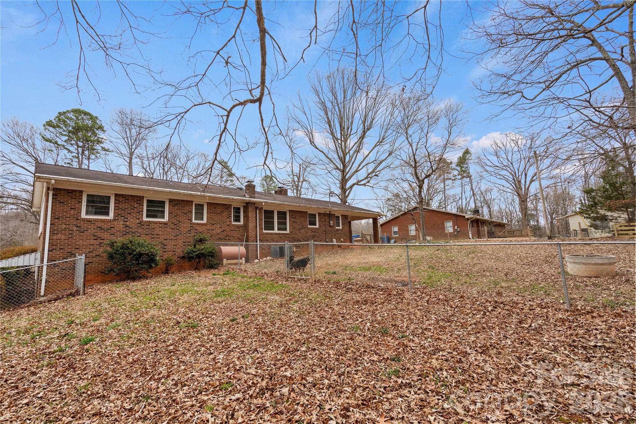 2231 Snuggs Park Road Albemarle, NC 28001 - Photo 25 of 30 a front view of a house with garden