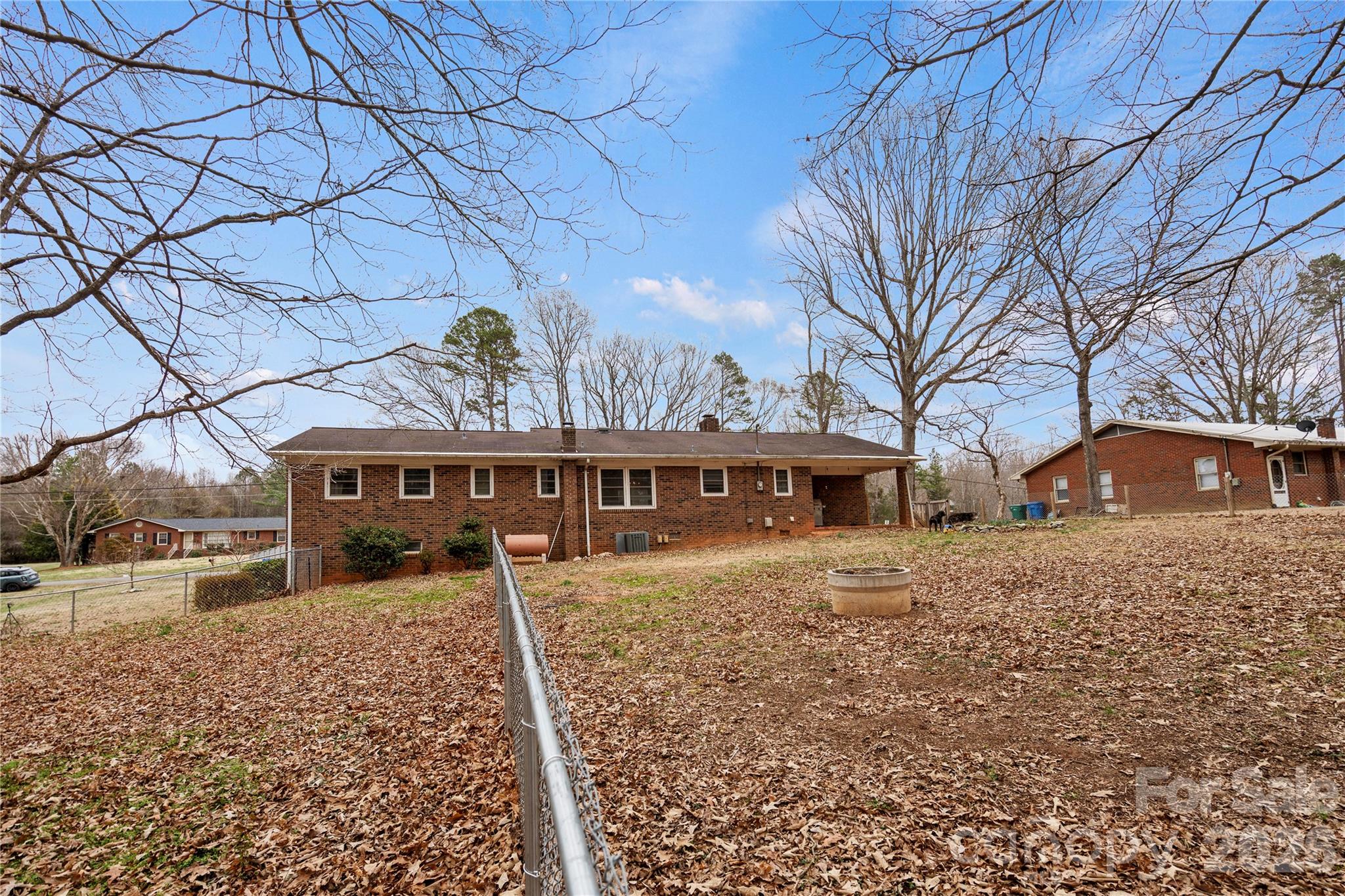 2231 Snuggs Park Road Albemarle, NC 28001 - Photo 26 of 30 front view of a house with a yard