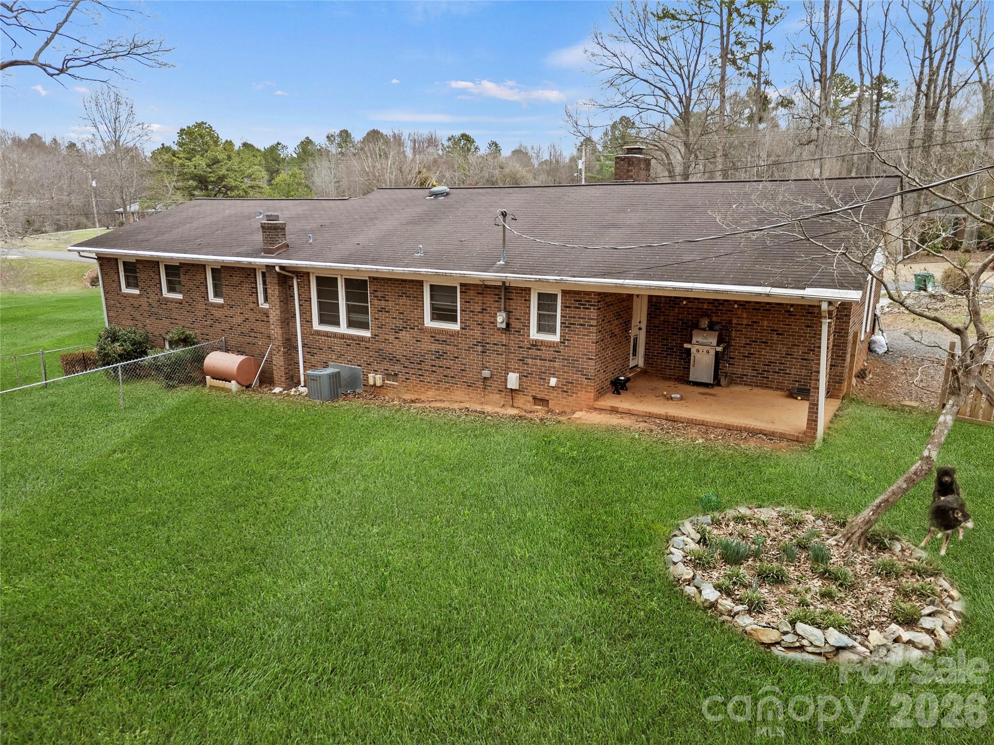 2231 Snuggs Park Road Albemarle, NC 28001 - Photo 4 of 30 a view of a house with a yard porch and sitting area