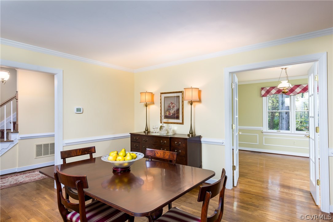 5705 North Chase Road Midlothian, VA 23112 - Photo 17 of 48 a view of a dining room with furniture window and wooden floor