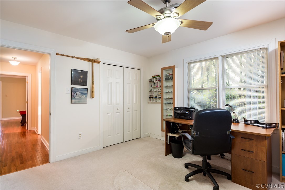 5705 North Chase Road Midlothian, VA 23112 - Photo 29 of 48 a view of a workspace with furniture and a window